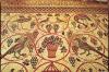 Detail, fruite basket flanked by birds